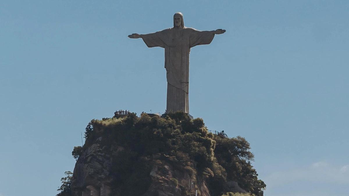 statue of jesus on hill